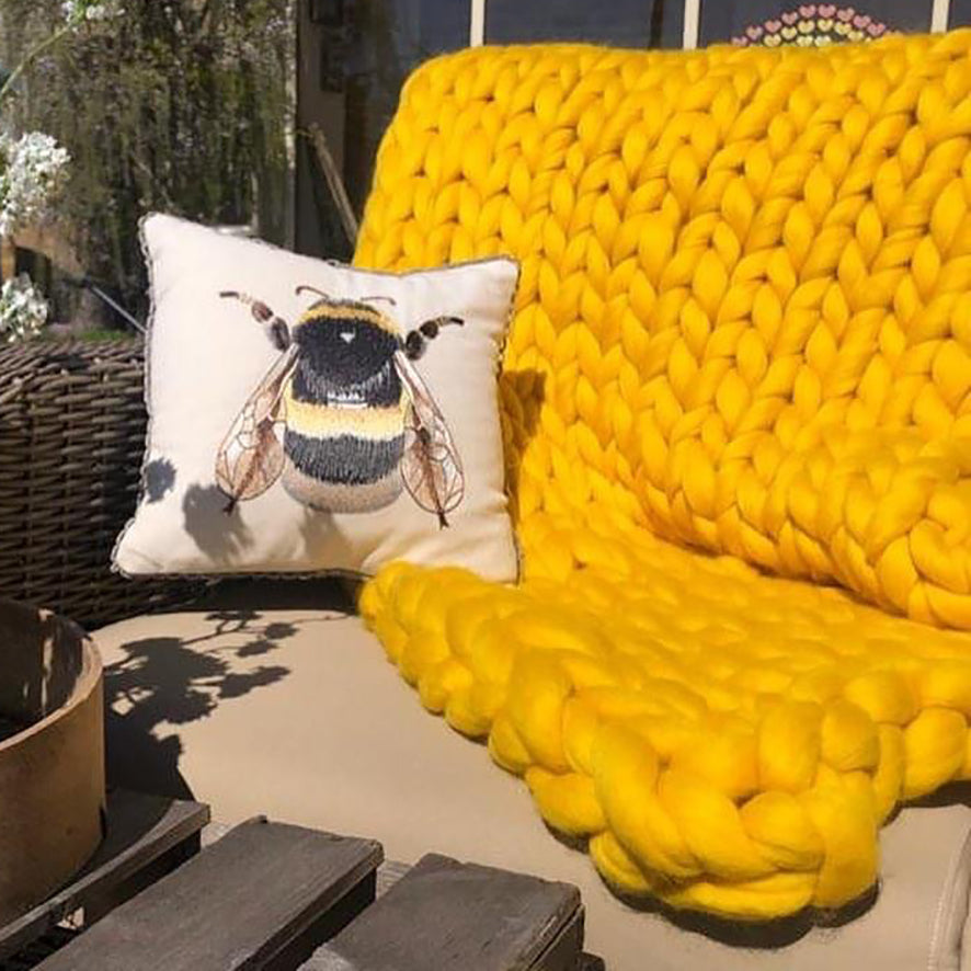 giant chunky knitted blanket in mustard